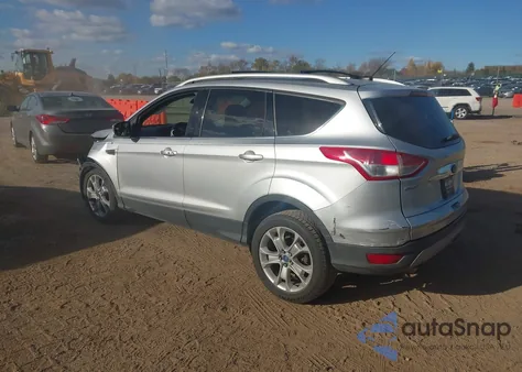 2014 Ford Escape Titanium from USA, damaged, VIN 1FMCU0J92EUA27856